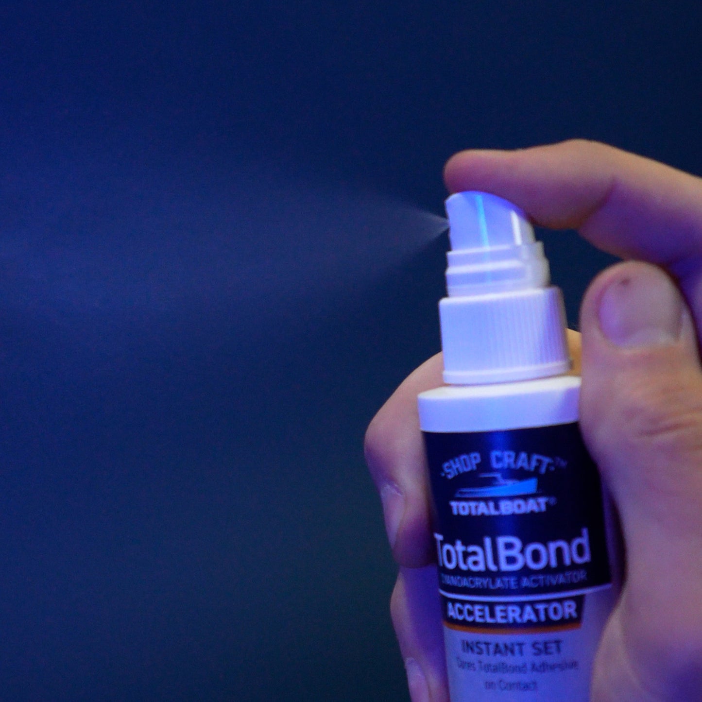 Closeup of TotalBoat TotalBond CA Glue Accelerator Spraying Fine Mist