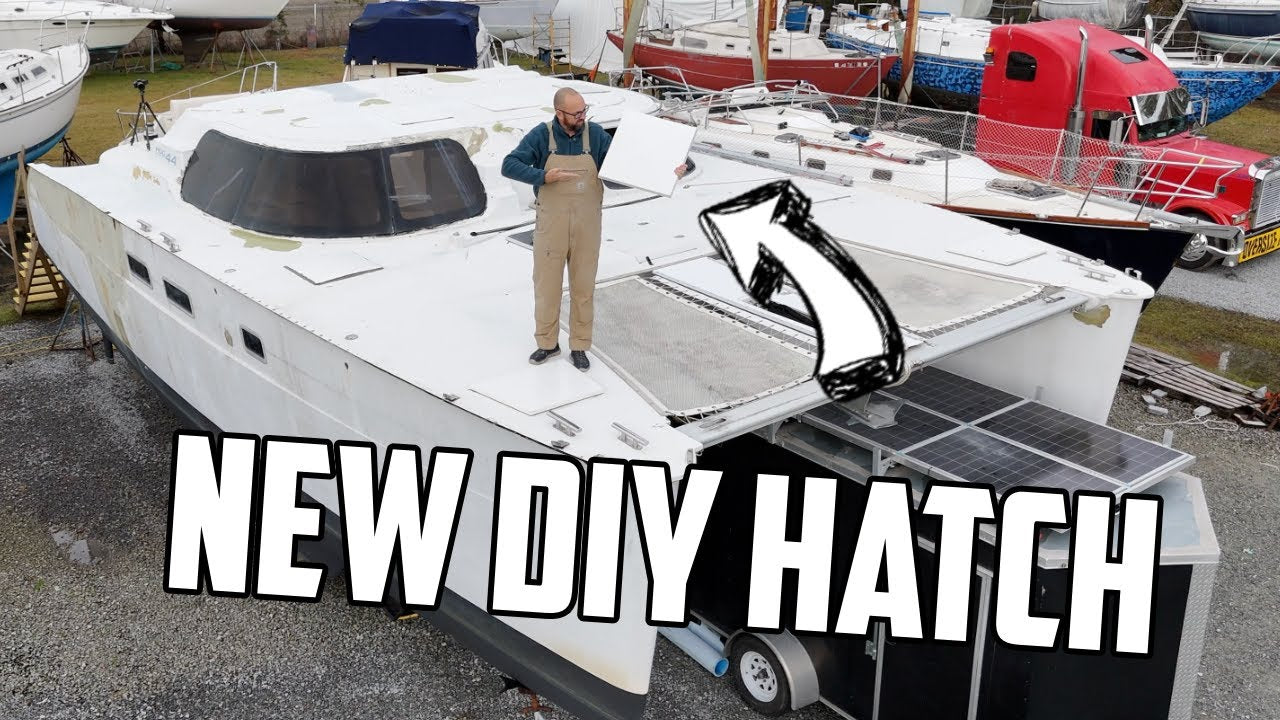 New DIY Hatch text over Mads standing on his catamaran