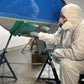 TotalBoat Antifouling Bottom Paint Supplies Kit: Rolling green paint on a boat bottom