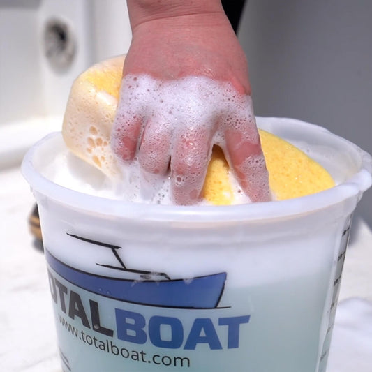 TotalBoat Boat Soap All Purpose Cleaner being used with a sponge
