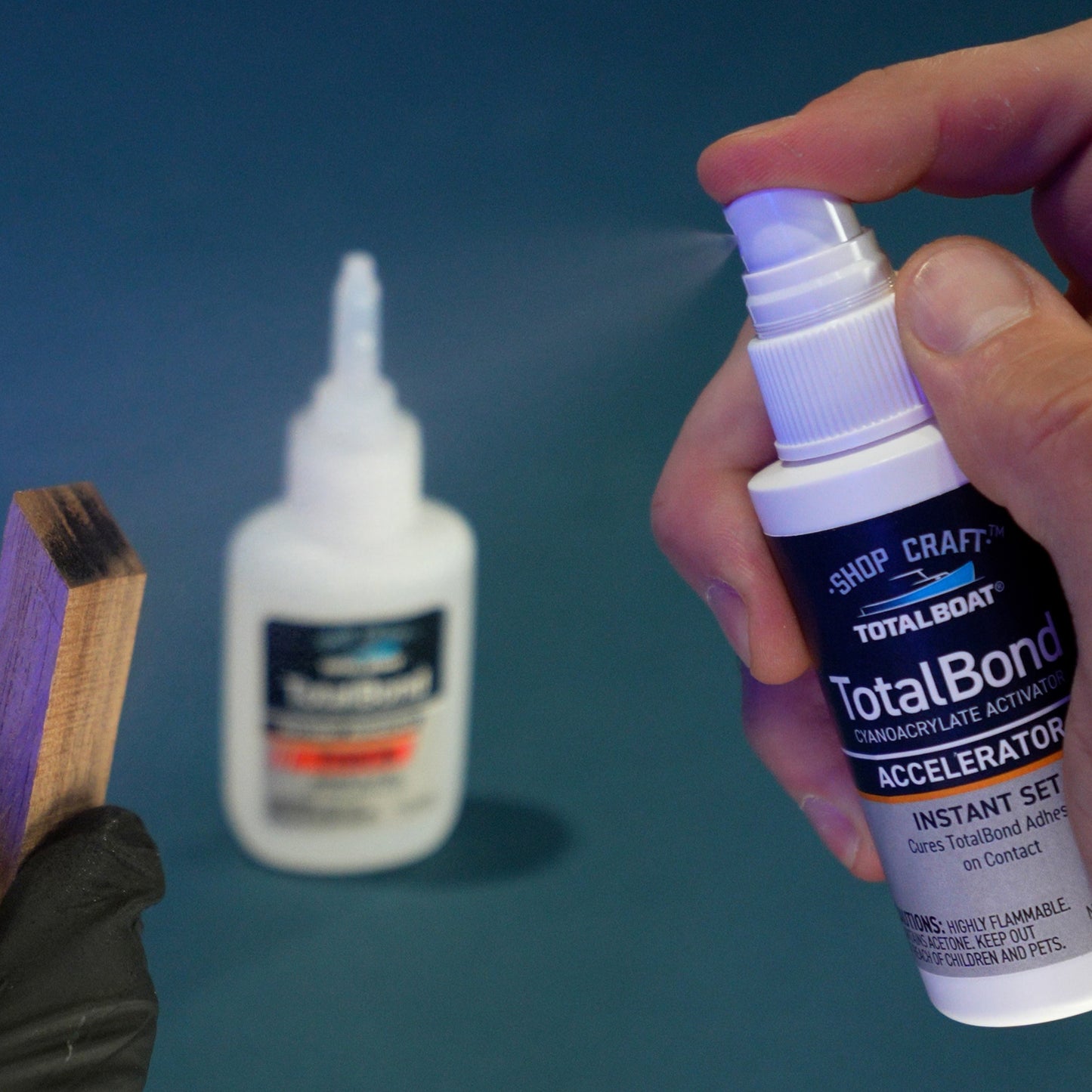 Spraying TotalBoat TotalBond CA Glue Accelerator on Wood