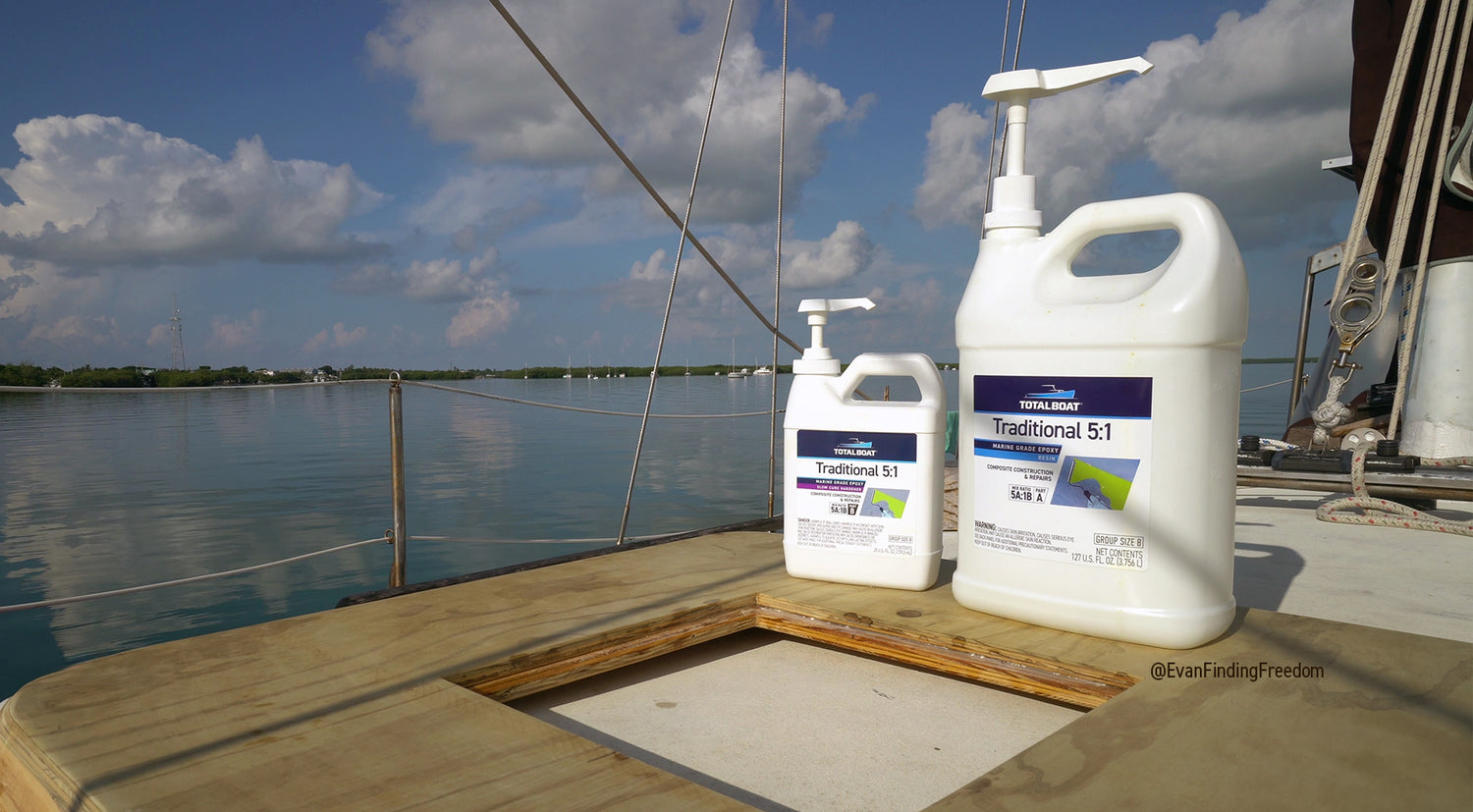 A plywood being adhered with TotalBoat Traditional 5:1 Epoxy on the deck of a sailboat at sea. 