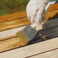 TotalBoat Teak Oil being applied to wood with a foam brush