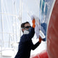 TotalBoat Wiping Rag being used on a boat exterior