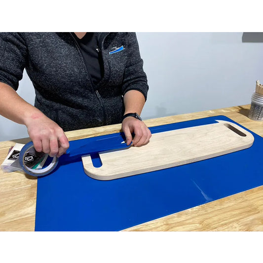 TotalBoat Epoxy Holiday Serving Board Kit taping the board