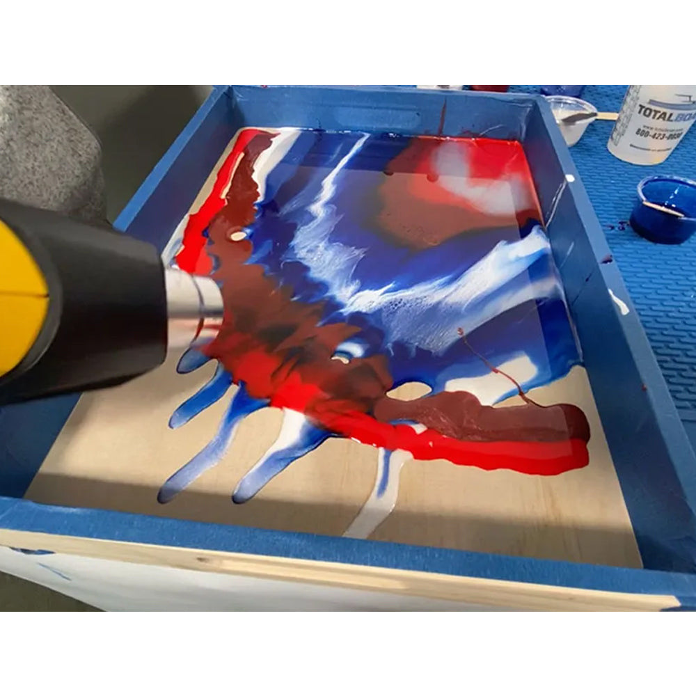 TotalBoat Epoxy Patriotic Serving Tray Mini Kit using the heat gun to blend the tinted epoxy