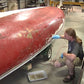 TotalBoat Polyester Laminating Resin being applied to a boat