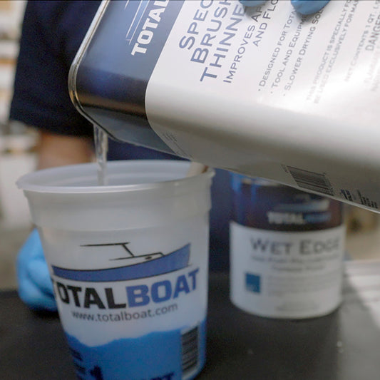 TotalBoat Special Brushing Thinner 100 being poured