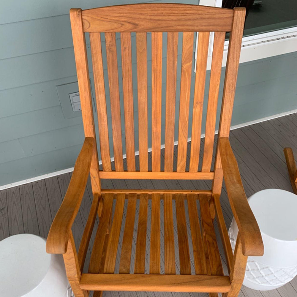 TotalBoat 2-Part Teak Wood Cleaner and Brightening System used on a porch chair