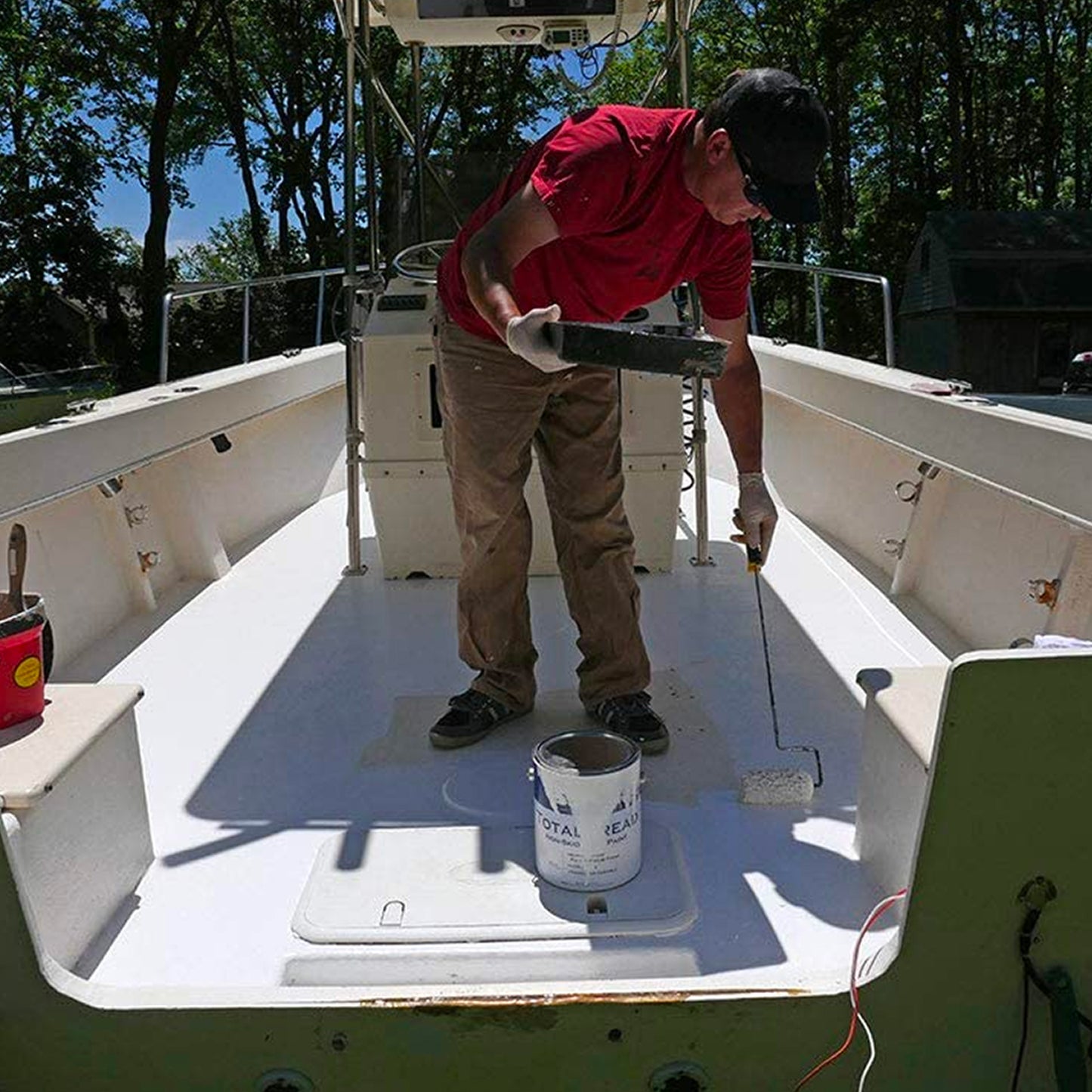 TotalBoat TotalTread Non-Skid Marine Deck Paint white being applied with a roller