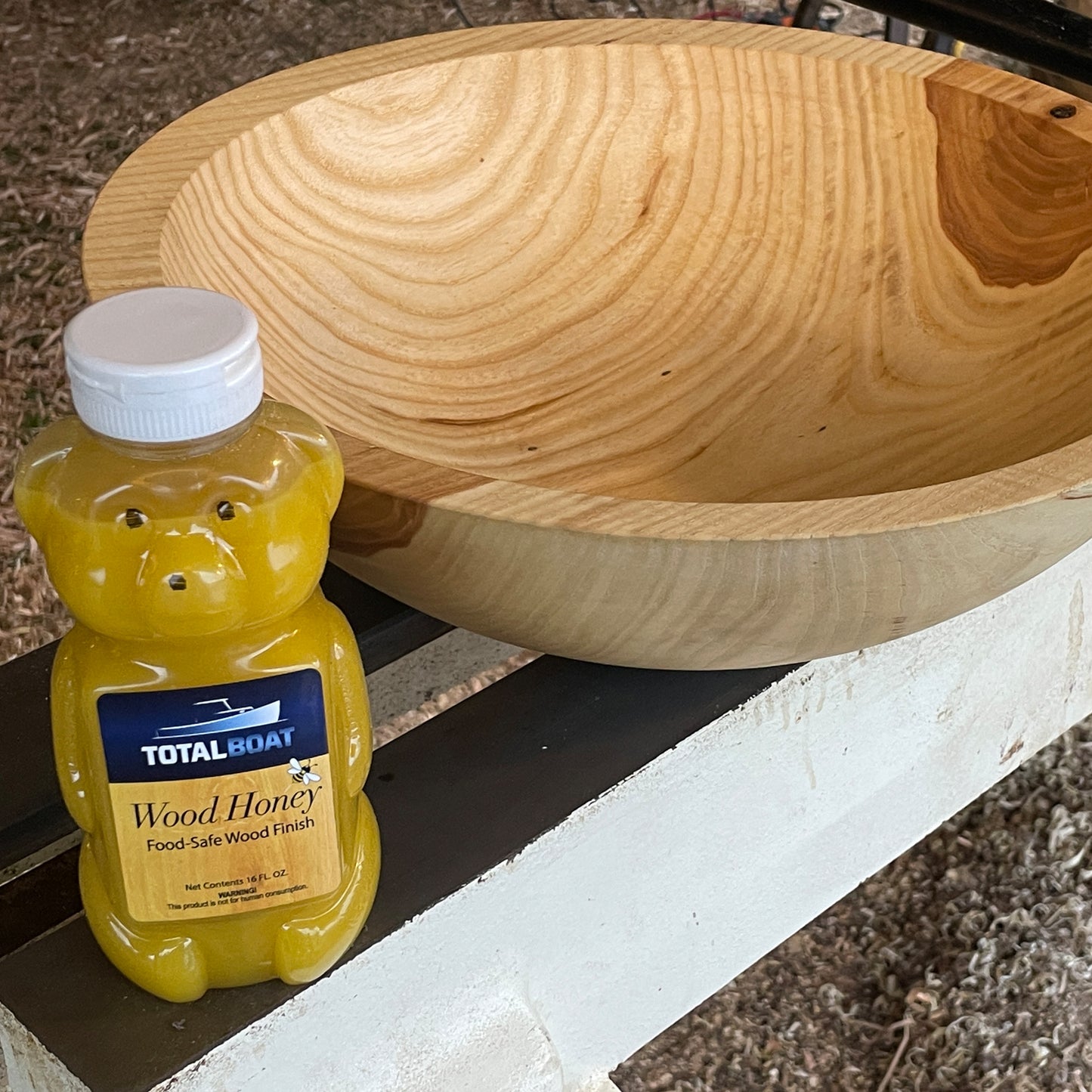 TotalBoat Wood Honey Food Safe Wood Finish used on a bowl